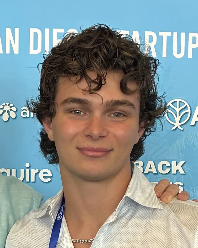Dawson, founder of College Cubbies, smiling