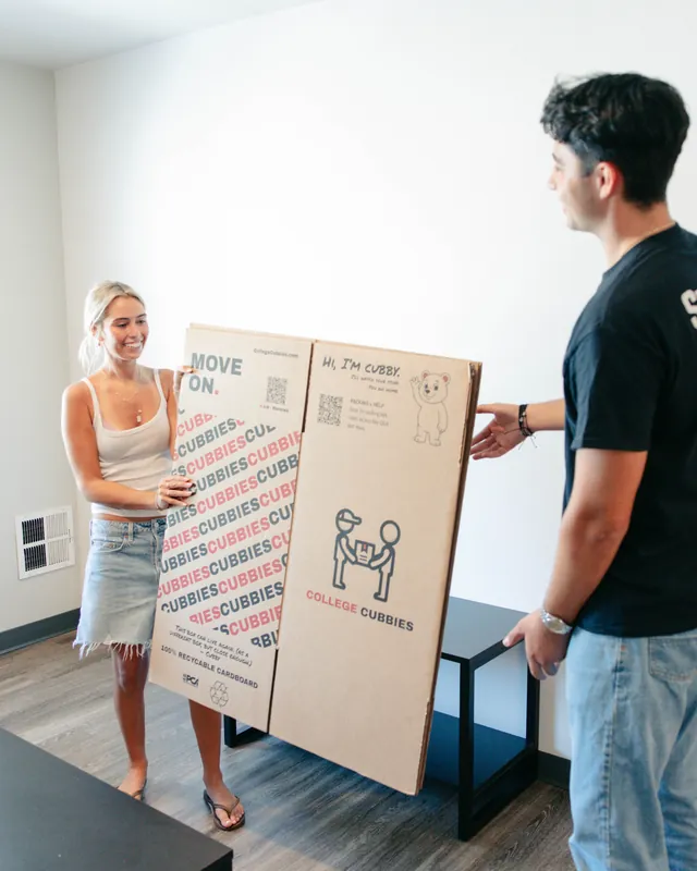 College students and the College Cubbies crew smiling on move day